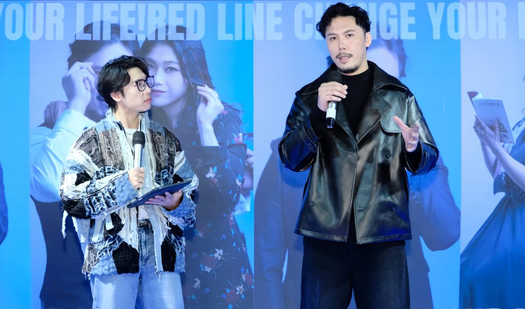 Event hosts presenting on stage at Grand Maple Eyewear event