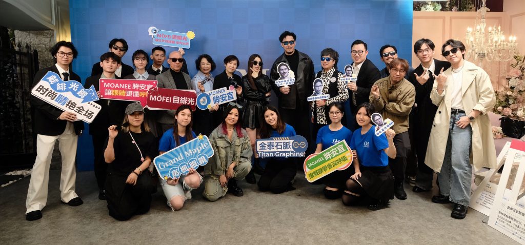 Event management team and client group photo at Grand Maple event