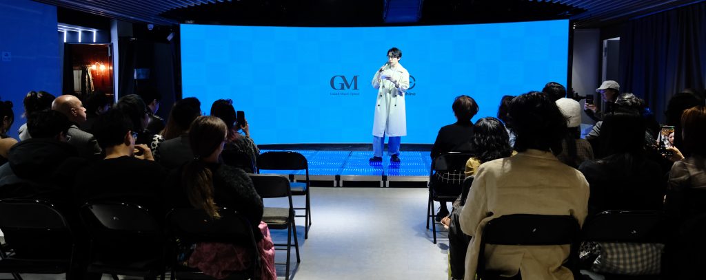 Grand Maple event_Host speaking on stage