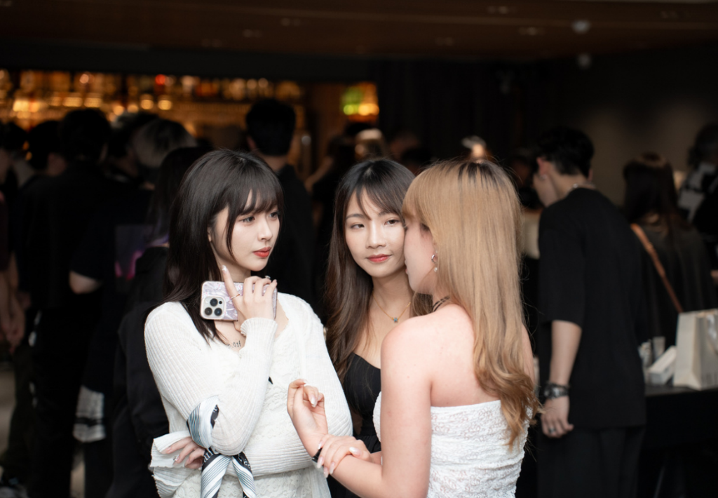Attendees networking and socialising at MILLIUS Co.Ltd event